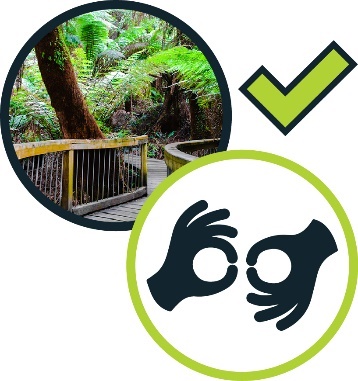 A pathway through a forested area and an icon for Auslan. Next to these is a tick.