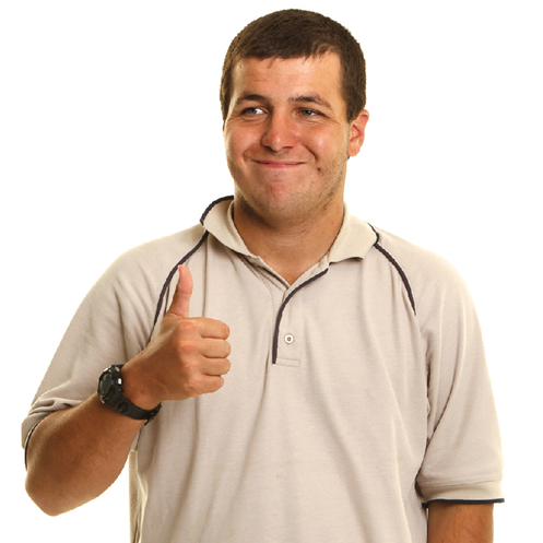 A smiling man giving a thumbs up.